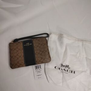 SOLD! This Coach Signature Wristlet